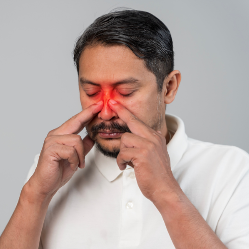 Medical professional examining nasal passages
